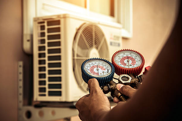 Professional Heat Pump Repair technician working in Overland Park, KS